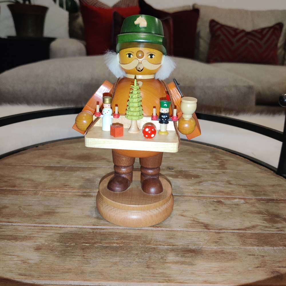 Steinbach Smoker Toy Merchant Nutcracker Figurine